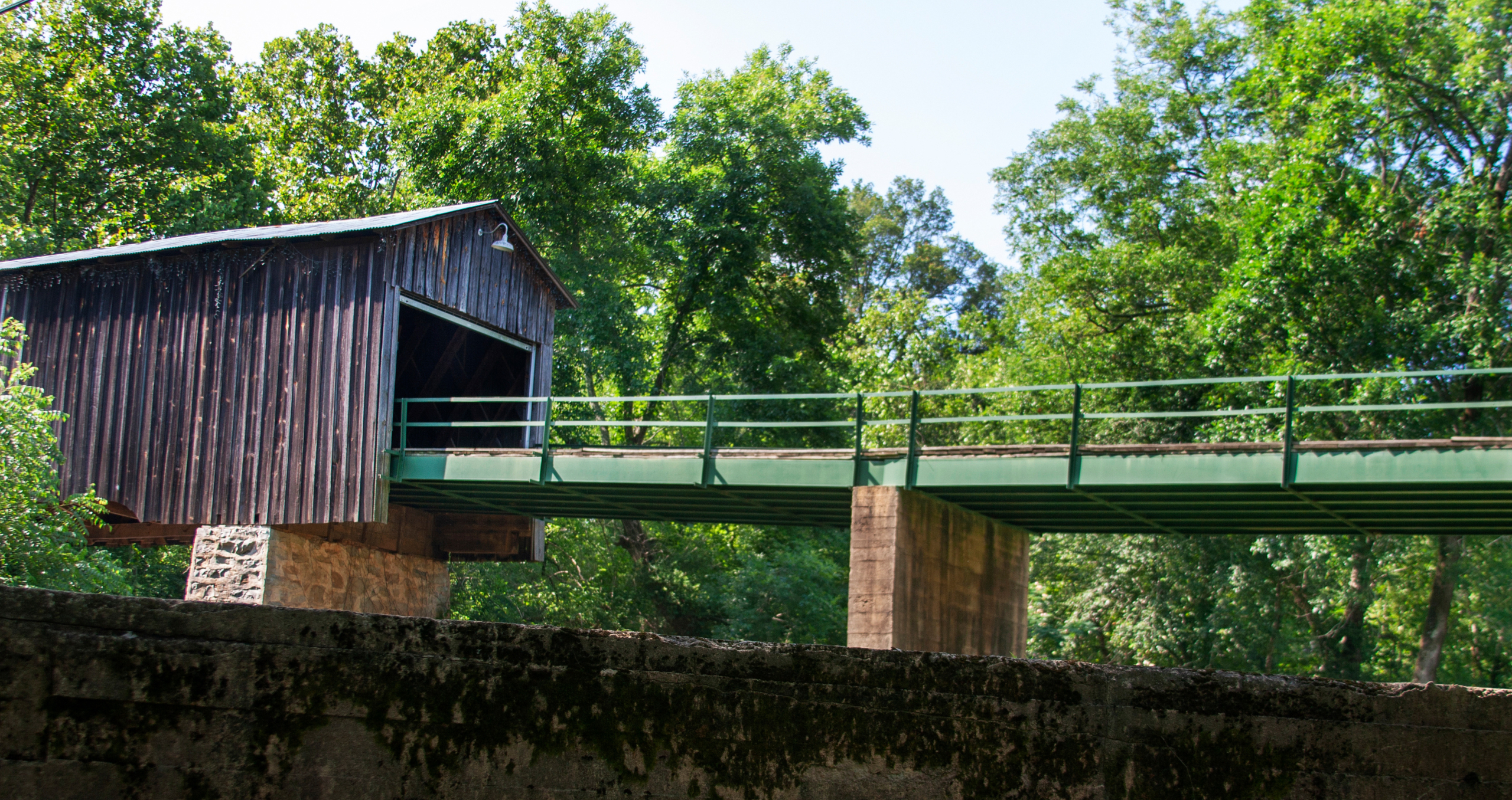 Euharlee Creek covered bridge surrounded by trees in Georgia